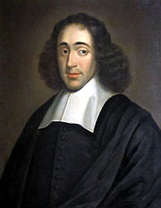 Picture of a painting of a man with dark eyes and dark hair, wearing a dark suit with a white collar.